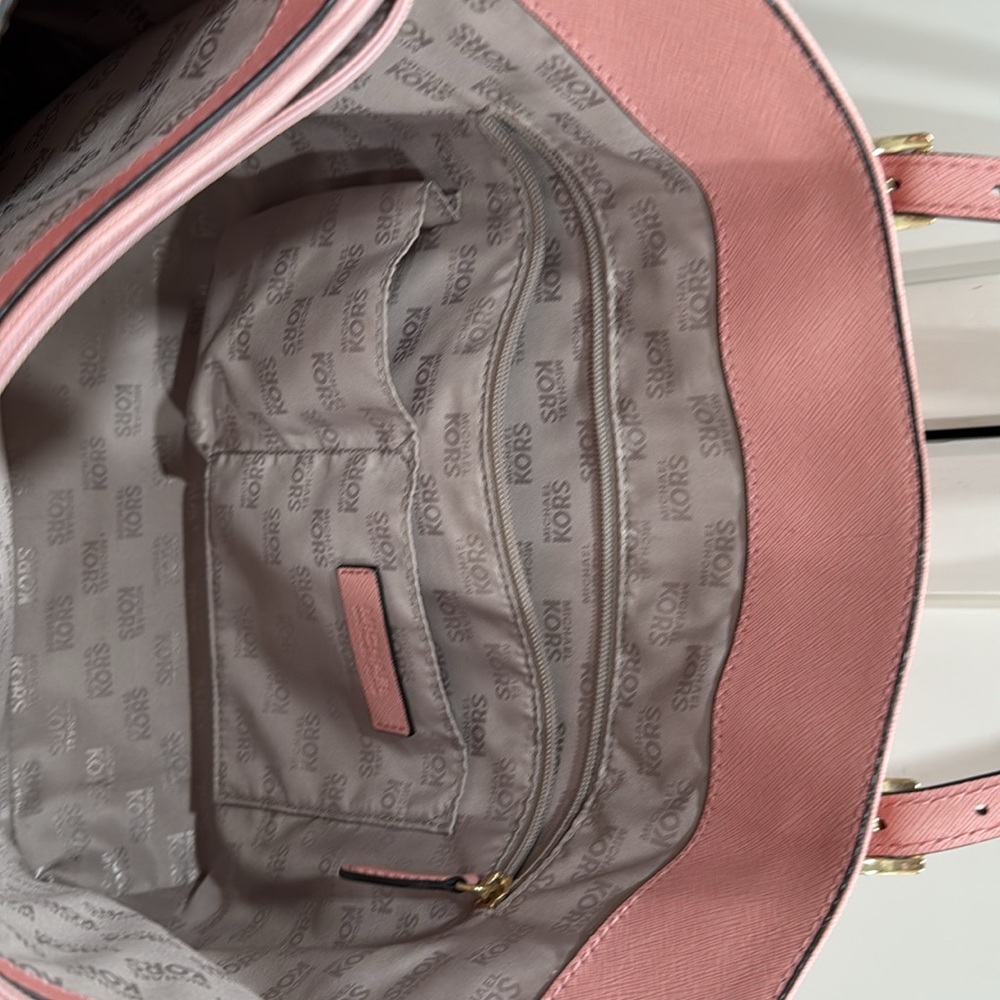 Michael Kors (MK) Pink Bag
Gently used great for work or play - Picture 12 of 15
